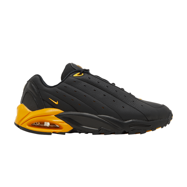 NOCTA x Nike Hot Step Air Terra 'Black University Gold'