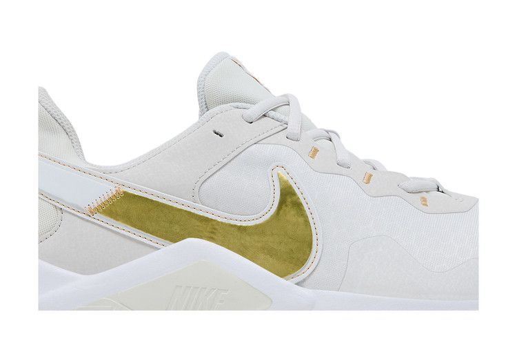 Nike Wmns Legend Essential 2 'Platinum Tint Metallic Gold Star'